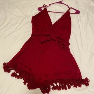 Casual romper with fringe detail & strappy back, elastic waist with fun tie belt